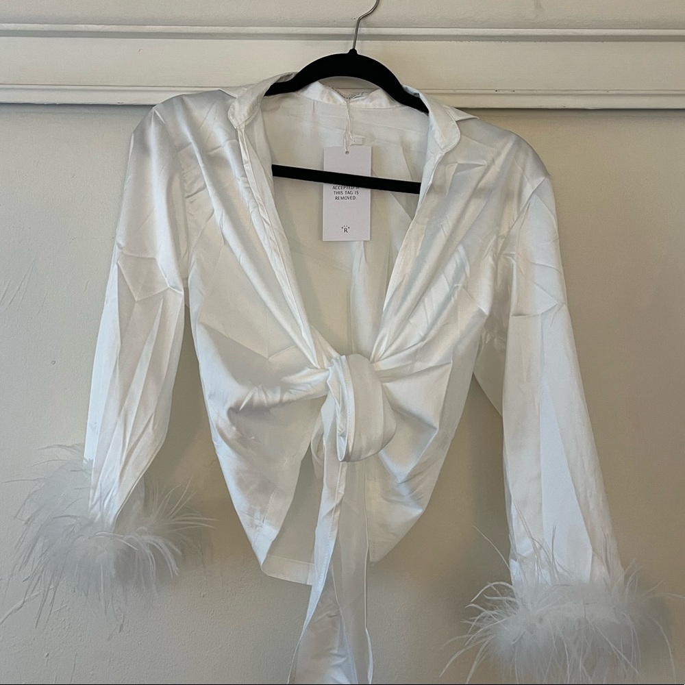 Shop Rumored satin tie top with feather sleeves